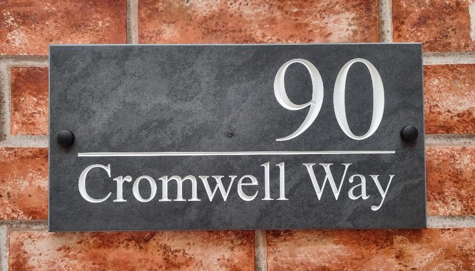 Image dispaying slate house sign 300mm by 150mm with a horizontal dividing line between the number 90 and the street name Cromwell Way