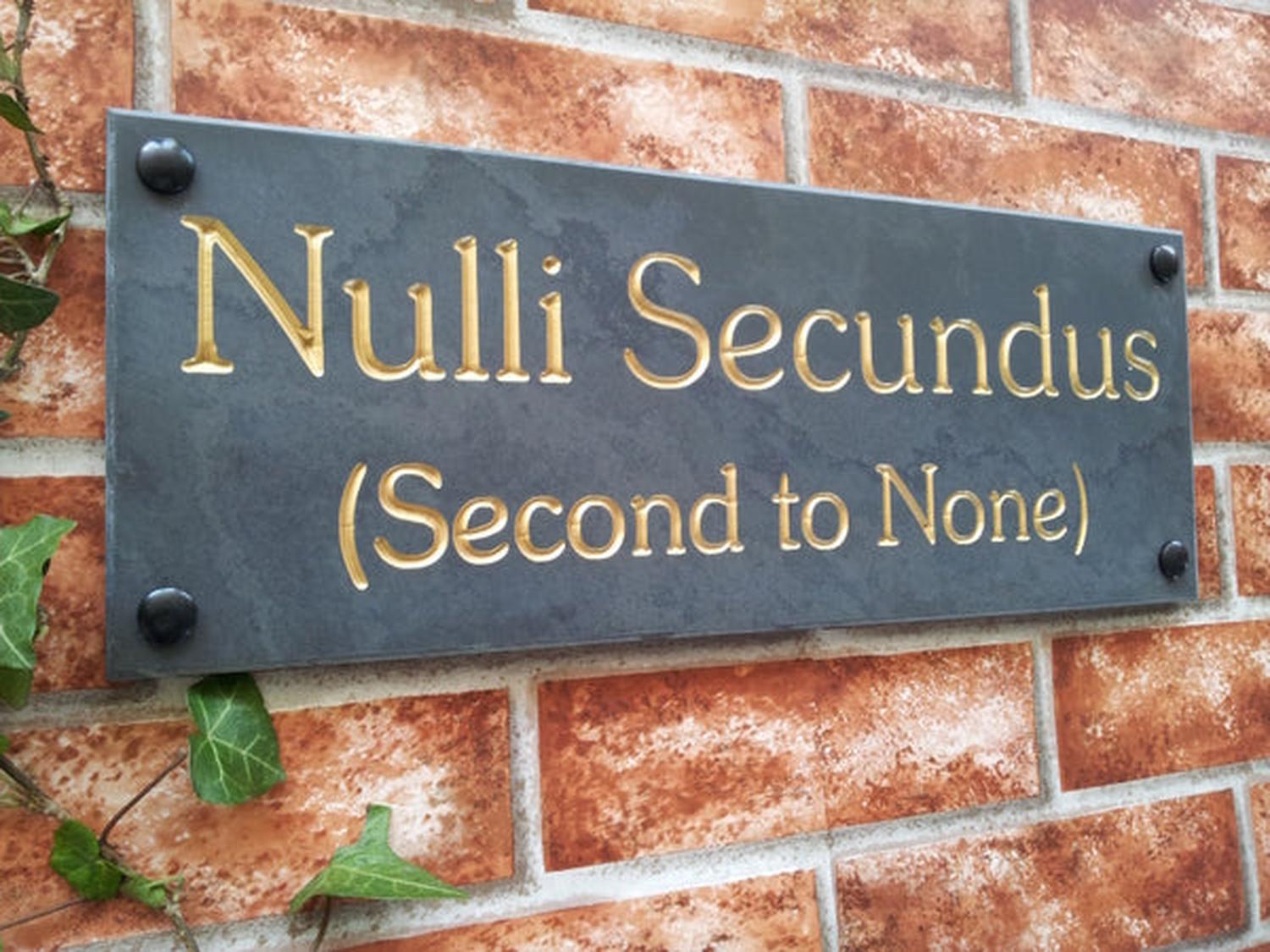 Slate house sign 400mm x 150mm close-up - personalised engraved plaque UK