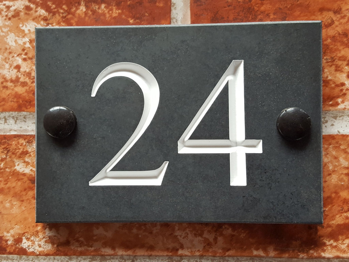 Economy house number sign budget close-up - cheap personalised plaque UK