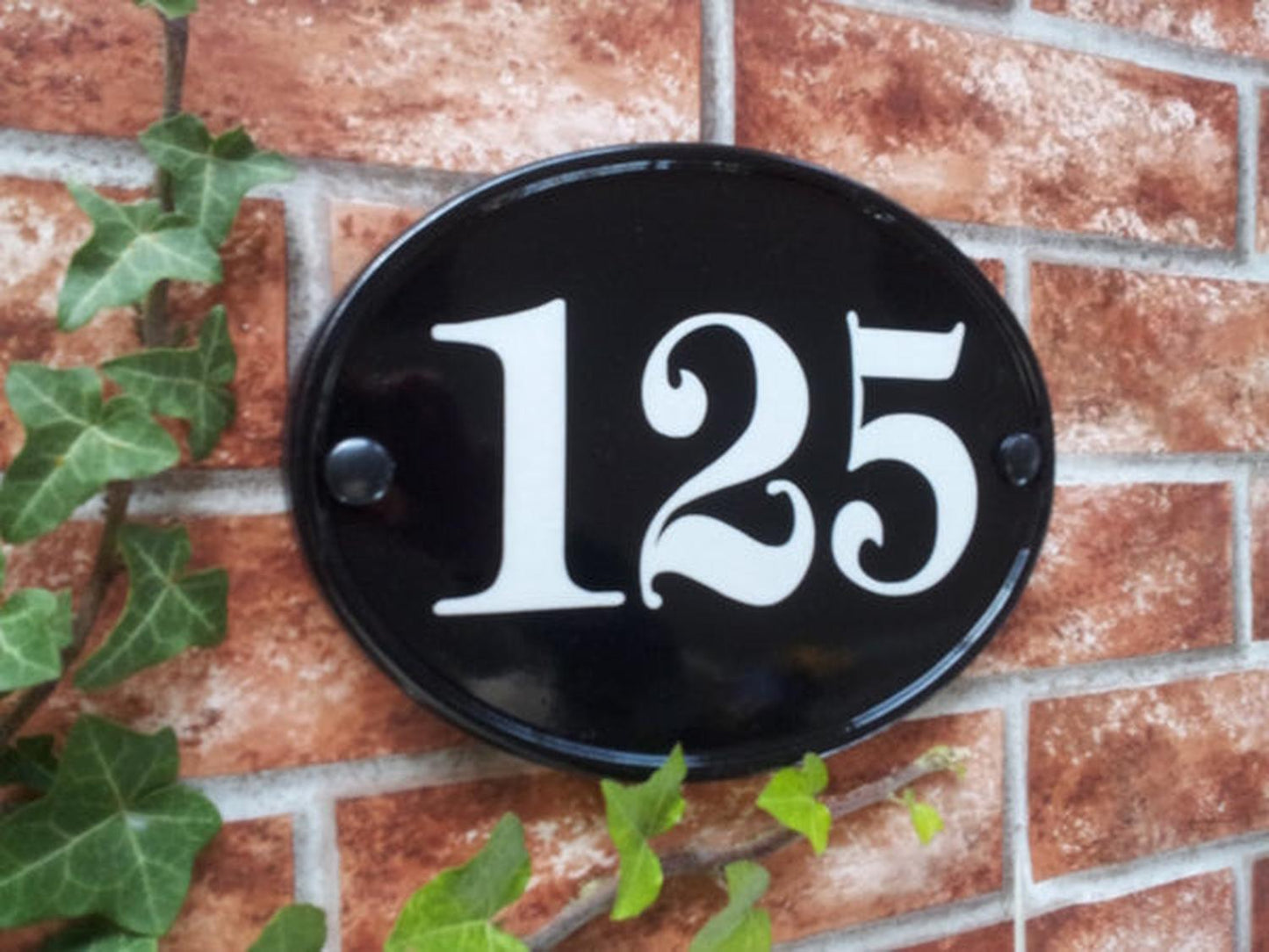 Bespoke medium oval house number sign - custom cast iron effect door number plaque UK